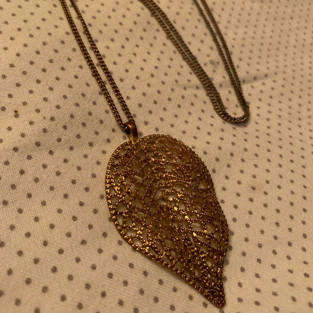 Long gold necklace